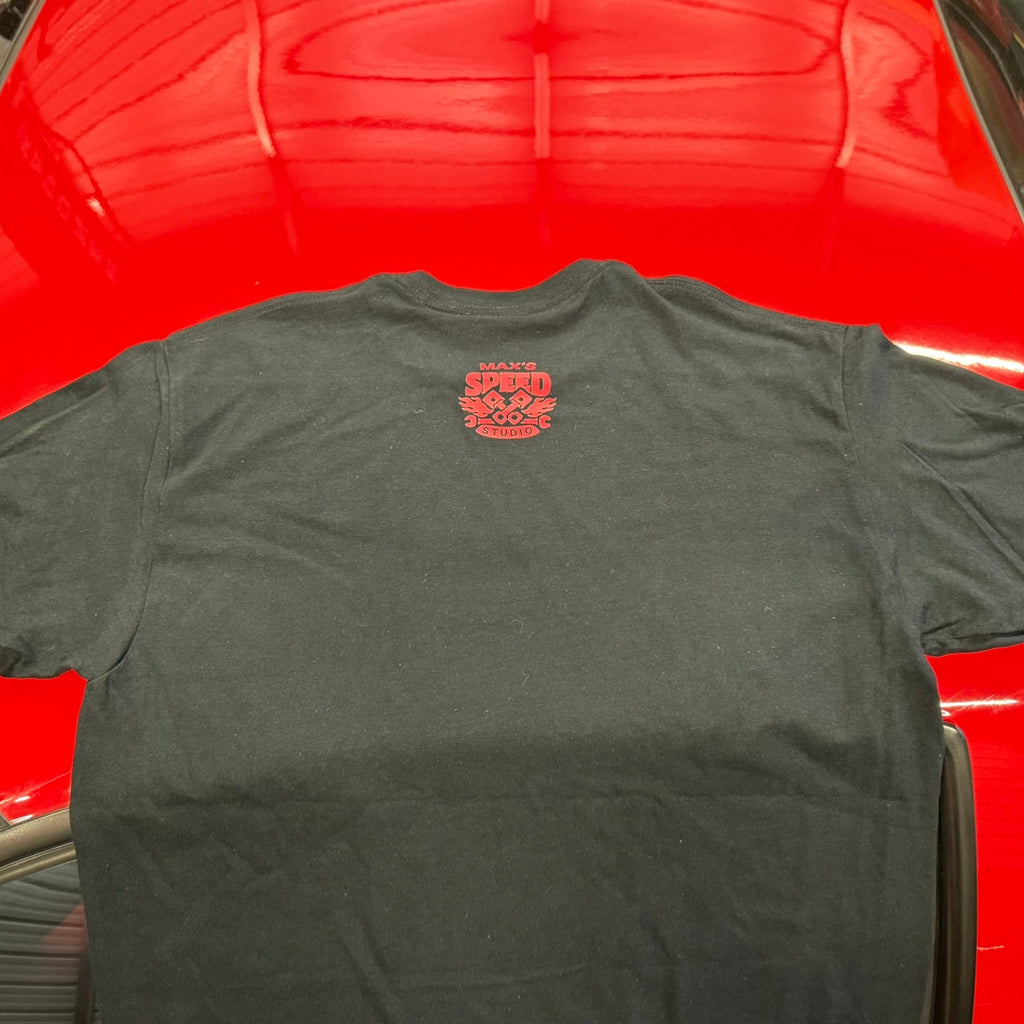Black t-shirt with a red logo on a red car