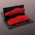 Plastic model showing a red corvette