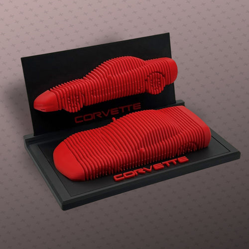 Plastic model showing a red corvette